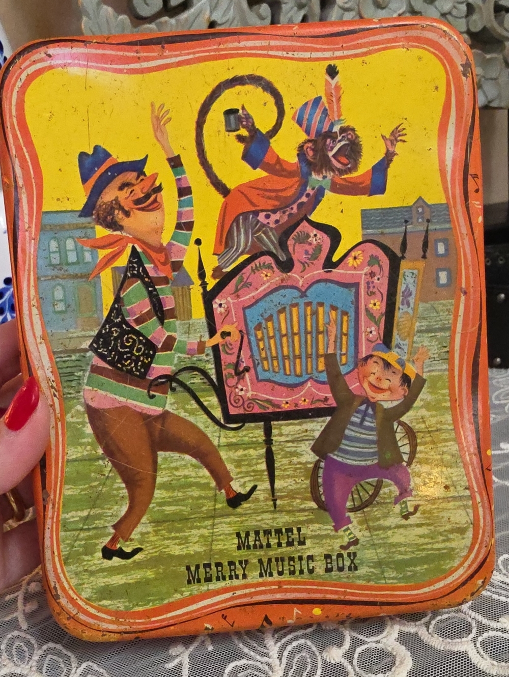 Vtg 1950 Mattel Yellow and Orange Merry Music Box Tin with Colorful Illustration